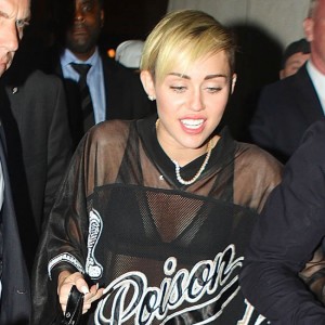 Miley Cyrus wears very revealing "Poison" jersey to 'SNL' 'After Party'